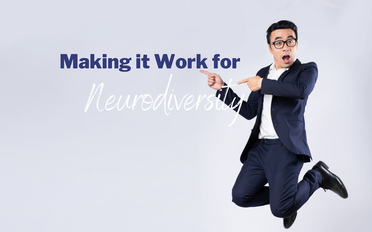 Man in a black and white business casual outfit jumping enthusiastically on a light blue background. The man is pointing at the words on the image, which says "Making it Work for Neurodiversity".