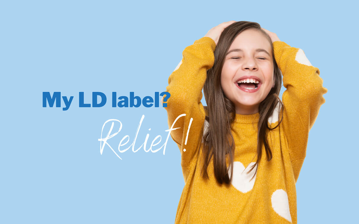 Young girl in a yellow sweater on a blue background throws her hands up happily. Image says, "My LD Label? Relief!"