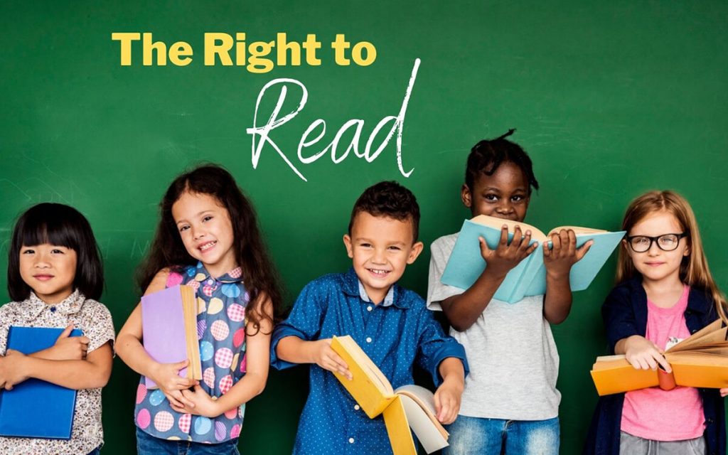 Five elementary school-age children stand lined up with books in their hands on a dark green background. Image text says "The Right to Read".