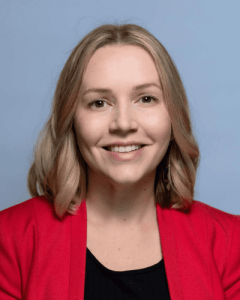 headshot of a young smiling caucasian female teacher