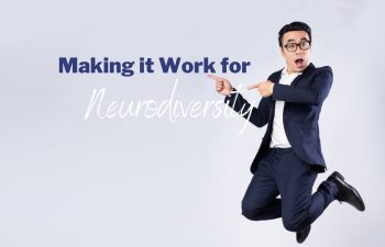 Man in a black and white business casual outfit jumping enthusiastically on a light blue background. The man is pointing at the words on the image, which says "Making it Work for Neurodiversity".